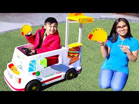 Liam Playing with New Taco Food Truck Ride On Toy