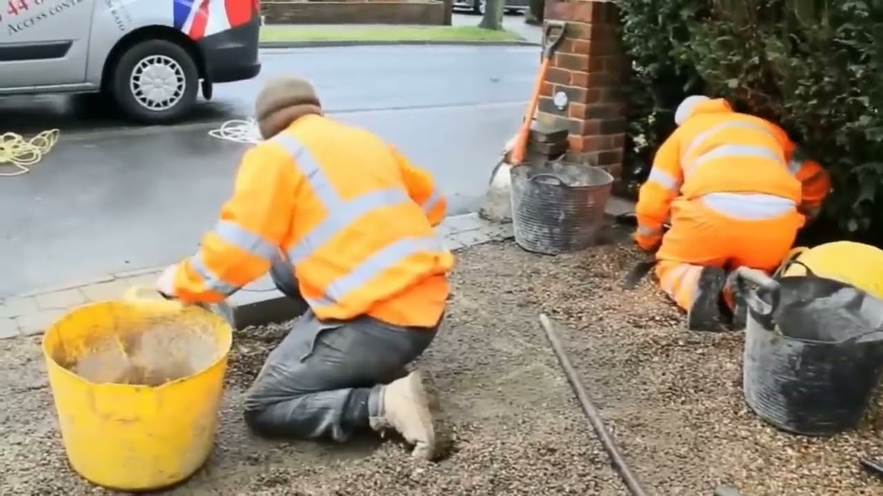 Installing automatic rising bollards on a private driveway.