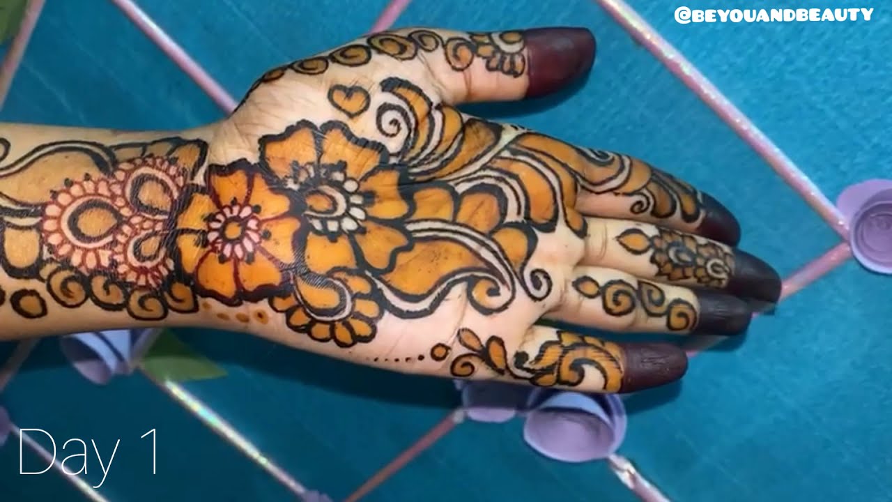 color mehndi design black and red shaded floral by be you and beauty
