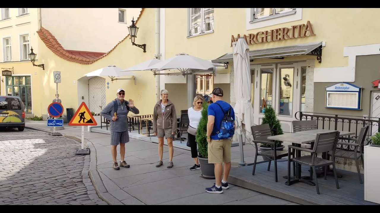 Immersive street-level walking tour through Vilnius Uzupis, Lithuania, showcasing authentic urban landscapes, local architecture, and the vibrant atmosphere of the city's neighborhoods