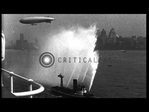 The American Ocean Liner SS Leviathan departs New York Harbor. Fireboats, dirigib...HD Stock Footage