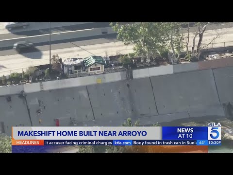 Makeshift home built along side 110 Freeway in L.A.
