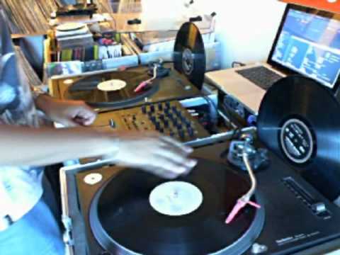 DJ Dynamight cutting it up on vinyl