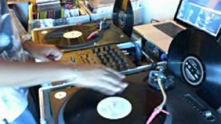 DJ Dynamight cutting it up on vinyl