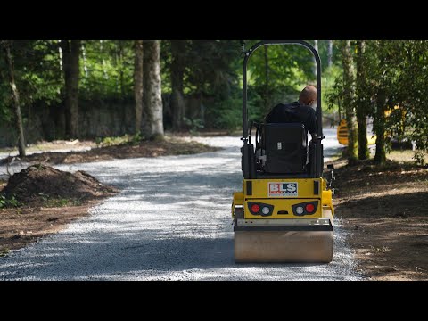 finishing the new drive with a road roller.