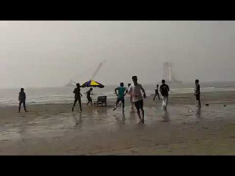 Playing Beach Football with friends