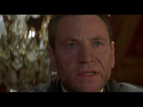 Kiss of the Dragon (2001) official trailer frame with Jet Li sprinting through Paris streets