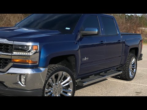 Silverado on 24 inch chrome replicas and 33s