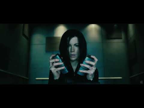 Trailer action montage — lab breach, freeway van fight, and Antigen corridors cut to propulsive cues