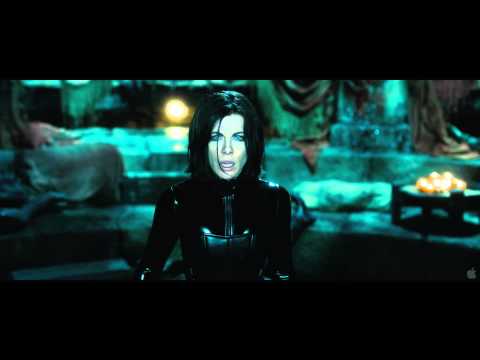 Trailer rhythm — strobe-lit corridors, muzzle flashes, and Haslinger’s percussive engine stitched to each cut