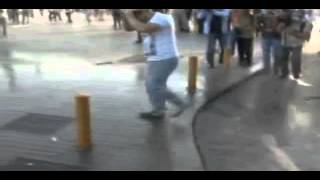 Dude gets washed by fire hose and dose a flip!