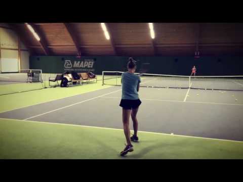 Pro player Anastasia Pribylova practicing basic strokes / ITS Tennis academy