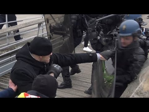 Boxing champion filmed 'punching' police officer