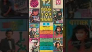 Download lagu karena putus cinta  / sebotol minuman'versi original '( titiek nur ) mp3