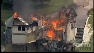Million-dollar mansion burns down and falls off a cliff