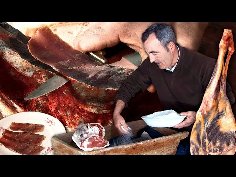 Homemade jerky with sheep leg, salt and paprika. Traditional recipe for this dehydrated meat