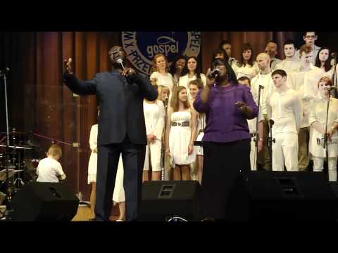 Pastor David Daniel and his wife singing 'Jesus loves me'