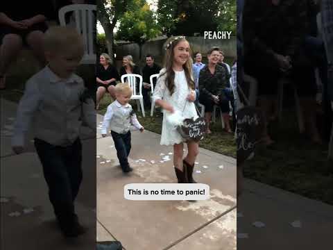 Love that he's against littering 🌸 #flowers #flowergirl #ringboy #weddings #shorts