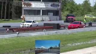 preview picture of video '2009 Pontiac G8 GXP vs. G8 GT 1/4 Mile Race'