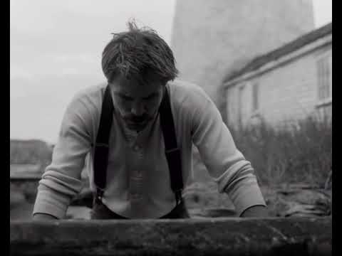 Robert Pattinson killing a seagull to 'Birds' by Death Grips, in which he has a guitar feature