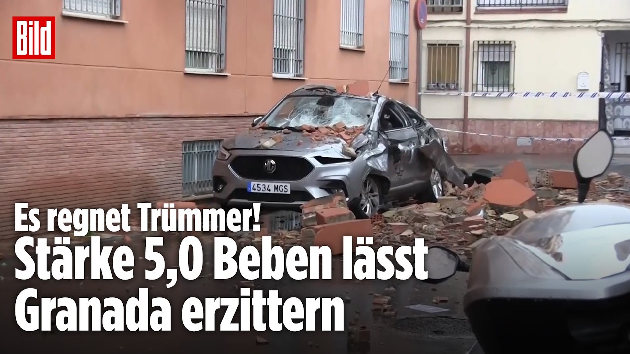 Erdbeben erschüttern Südspanien: Touris warten mit Koffern auf der Straße
