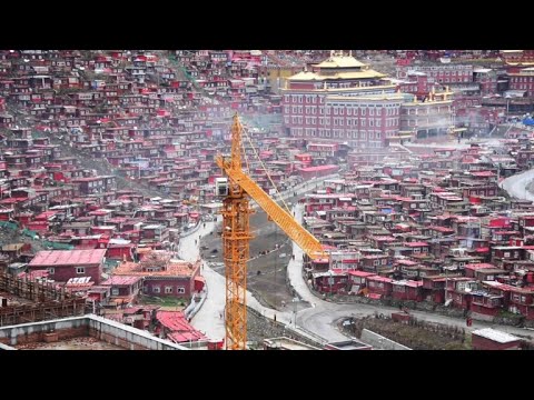 With demolitions, China squeezes Buddhist academy