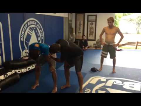 Alvaro Romano and  the surfer Adriano de Souza