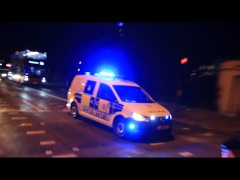 British Transport Police Dog Unit responding through rush hour traffic