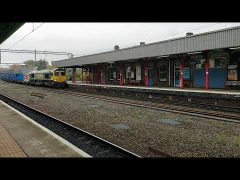 66570 at Stockport on Runcorn to Brindle Heath empty binliner. 19th Oct. 2020 at 12.45
