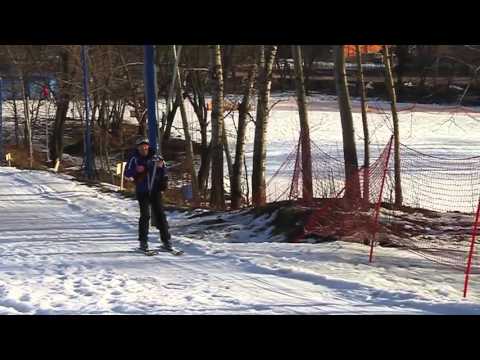 Roman Buzylev gives a master class for ski-balalaika.