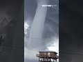 A massive waterspout looms off the coast of Florida!