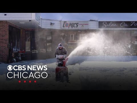 Chicago area digs out from unusually early first heavy snowfall of the season