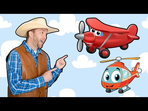 Man in a cowboy hat and vest points at a red cartoon airplane and a smiling orange helicopter in a blue sky with clouds, as if explaining flight toys.