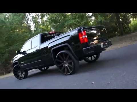 Murdered Out GMC Sierra on Dub Wheels at Mlk Park in Memphis TN