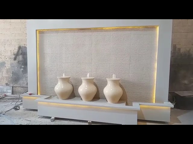 شلال انسيابي مع جرات نوافير