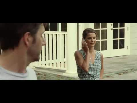 Dark Skies trailer frame: silhouetted figure at a window with static in the air