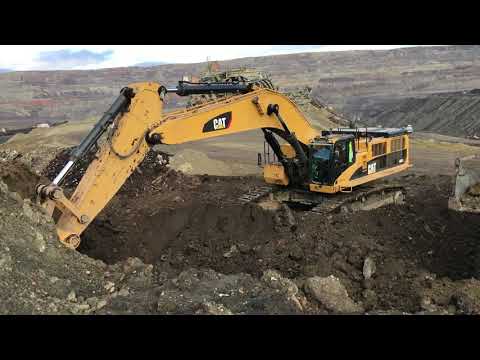 Caterpillar 385C Excavator Loading Caterpillar Dumpers - Kivos Ate