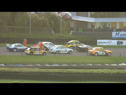 Look what happens to the leader! Super Retro rallycross cars do battle in the Lydden Hill finals.