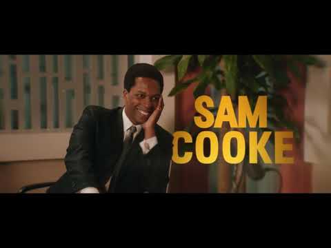 Audience close-up from trailer, applause rising during on-stage climax