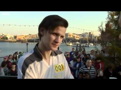 Matt Smith carries the Olympic Torch in Cardiff (26 May 2012)