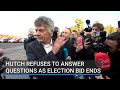 Hutch refuses to answer questions as election bid ends