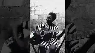 lizzy Ralph plays Hello God on accoustic guitar