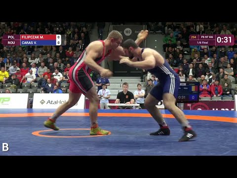 1/8 FS - 97 kg: M. FILIPCZAK (POL) df. V. CARAS (ROU), 8-1