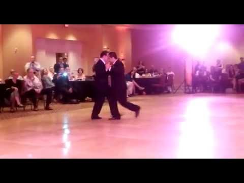 Carlos Urrego  and  Daniel Martinez  are  dancing  to  the  tango  "  El Cencerro  "  by  Juan D'Arienzo  at  New Orleans Tango Festival  in  2016
