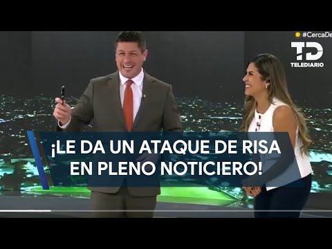 Luis Carlos Ortiz suffers a fit of laughter during a live newscast; he thought he had an insect.