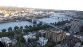 preview picture of video 'Cockpit view Portland Downtown heliport landing at sunset in an R44 Helicopter'