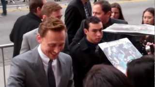 Tom Hiddleston gets a mysterious gift from fans at Marvel's 'The Avengers' Premiere