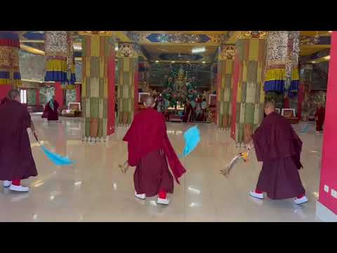 Monks rehearsing the secret ritual dance of Tsacham at Mindrolling Monastery, India.