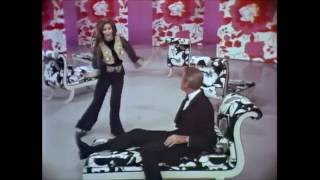 Raquel Welch & Jimmy Stewart flirting