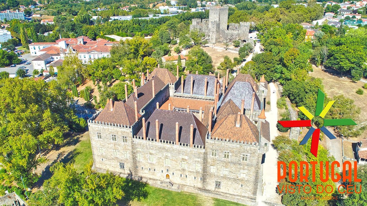 Immersive street-level walking tour through Guimaraes Castle, Spain, showcasing authentic urban landscapes, local architecture, and the vibrant atmosphere of the city's neighborhoods